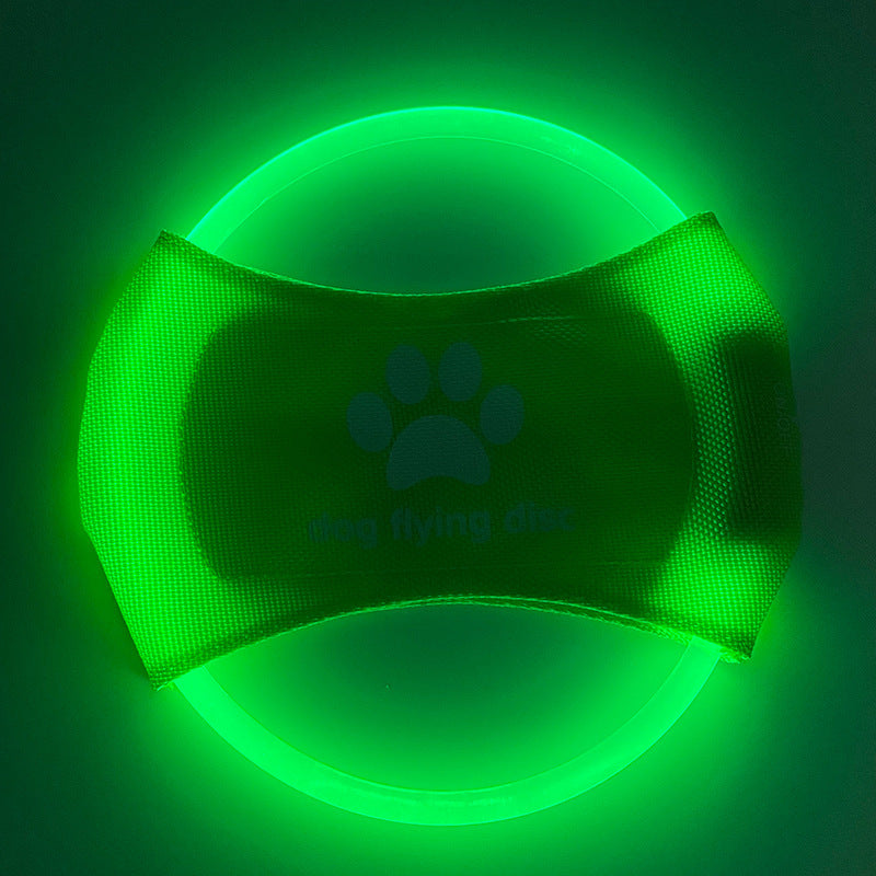 Dog catching the GlowCatch light-up disc