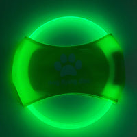 Dog catching the GlowCatch light-up disc